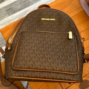 Michael Kors Backpack. No marks or stains on the inside or outside.